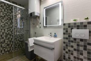 Koupelna v ubytování Reza Luxury Apartment