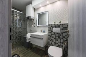 Koupelna v ubytování Reza Luxury Apartment