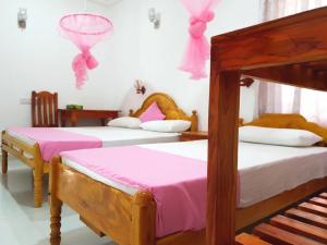 Voodi või voodid majutusasutuse SNP Star Guest House toas