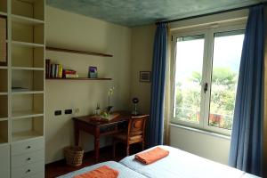 Postel nebo postele na pokoji v ubytování B&B Dolce vista al lago Lugano