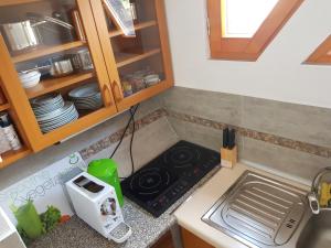 Kuchnia lub aneks kuchenny w obiekcie Sofias Apartment