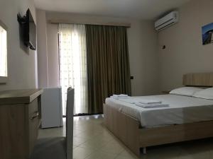 Postel nebo postele na pokoji v ubytování Hotel Villa Aljor