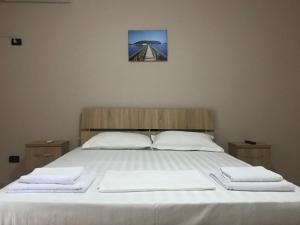 Postel nebo postele na pokoji v ubytování Hotel Villa Aljor