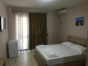 Postel nebo postele na pokoji v ubytování Hotel Villa Aljor