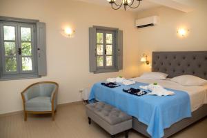 Cama ou camas em um quarto em villa aneme Spetses