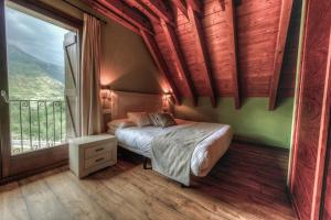 Postel nebo postele na pokoji v ubytování Apartahotel Tres Quiñones