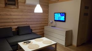 TV a/nebo společenská místnost v ubytování "Prawie nad morzem"