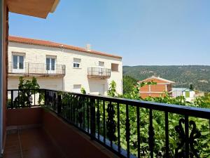a balcony with a view of a building at Hostal Almenara in Paterna del Madera