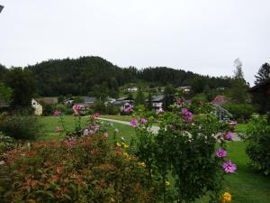 Vonkajšia záhrada v ubytovaní Bungalows Raschun Grabelsdorf Etruskerweg 10 A-9122 St.Kanzian