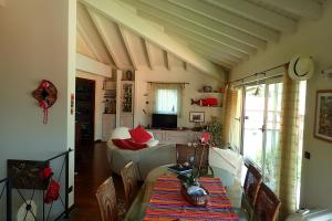 TV a/nebo společenská místnost v ubytování B&B Dolce vista al lago Lugano