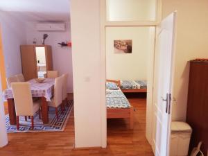 Postel nebo postele na pokoji v ubytování Apartments Glibo