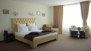 Postel nebo postele na pokoji v ubytování Hotel Asteri