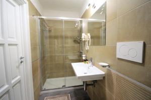 Koupelna v ubytování Hotel Residence Il Gabbiano