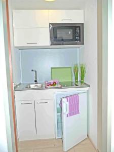 Dapur atau dapur kecil di Wohlfühlappartement mit Bergblick