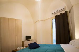 Postel nebo postele na pokoji v ubytování B&B IL SEGRETO