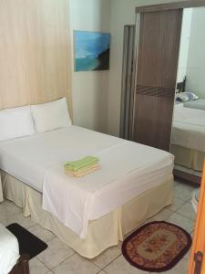 Postel nebo postele na pokoji v ubytování Dias de Sol & Mar + 19 fotografií