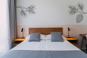 Postel nebo postele na pokoji v ubytování MORENIA All Inclusive Hotel