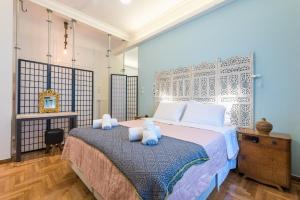Katil atau katil-katil dalam bilik di Splash Of Glam I 10 steps from Acropolis