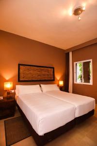 Postel nebo postele na pokoji v ubytování Chillout Hotel Tres Mares