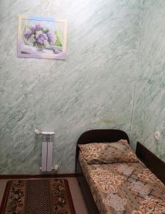 Ein Bett oder Betten in einem Zimmer der Unterkunft Smart Hotel on Gogolya