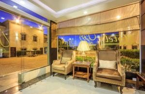 منطقة جلوس في Al Muhaidb Residence for Chalets and Holidays Homes المهيدب ريزدنس لبيوت العطلات