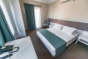 Postel nebo postele na pokoji v ubytování Elia Hotel Cunda by Ortunc