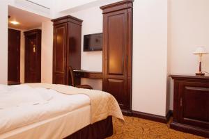Postel nebo postele na pokoji v ubytování Hotel Bellaria