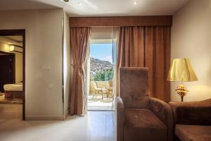منطقة جلوس في Al Muhaidb Residence for Chalets and Holidays Homes المهيدب ريزدنس لبيوت العطلات