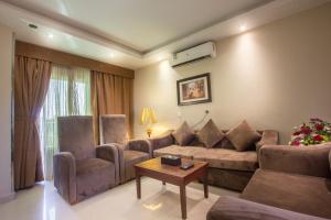 منطقة جلوس في Al Muhaidb Residence for Chalets and Holidays Homes المهيدب ريزدنس لبيوت العطلات
