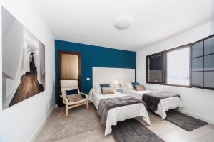 Postel nebo postele na pokoji v ubytování Luxury Beach Apartments