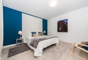 Postel nebo postele na pokoji v ubytování Luxury Beach Apartments