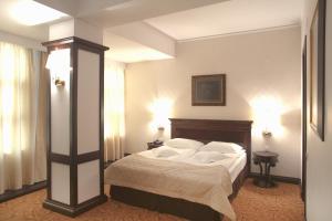 Postel nebo postele na pokoji v ubytování Hotel Bellaria