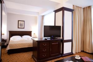 Ένα ή περισσότερα κρεβάτια σε δωμάτιο στο Hotel Bellaria