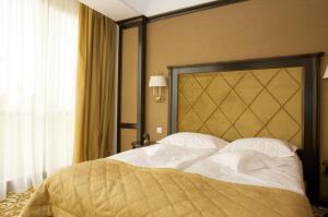 Postel nebo postele na pokoji v ubytování Hotel Bellaria