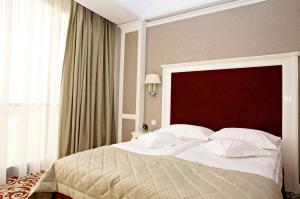 Postel nebo postele na pokoji v ubytování Hotel Bellaria