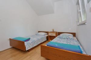 Postel nebo postele na pokoji v ubytování Villa Neyla