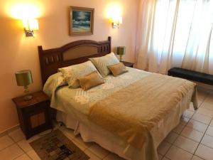 Katil atau katil-katil dalam bilik di Hotel CostaFósil