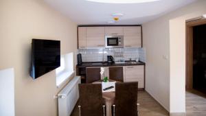 Kuchyň nebo kuchyňský kout v ubytování Irány Colorado Apartman