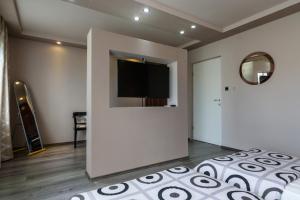 Televízia a/alebo spoločenská miestnosť v ubytovaní Apartments Lara - Split Croatia