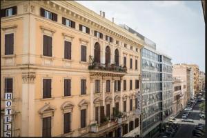 Nespecifikovaný výhled na destinaci Řím nebo výhled na město při pohledu z penzionu