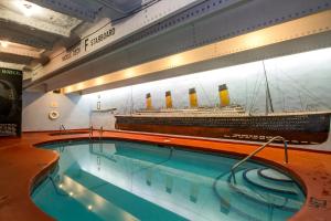 a model of a cruise ship and a swimming pool at Three Valley Lake Chateau in Revelstoke