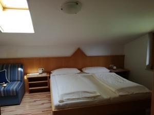 Postel nebo postele na pokoji v ubytování Haus Salzachblick