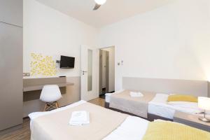Postel nebo postele na pokoji v ubytování Pension Akat + 26 fotografií