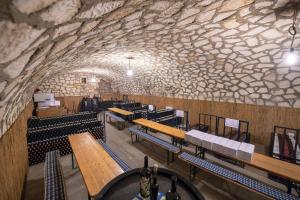 Reštaurácia alebo iné gastronomické zariadenie v ubytovaní Sekt & Wein - Walter Klein
