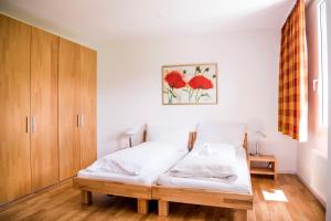 Postel nebo postele na pokoji v ubytování Hotel & Bildungszentrum Matt