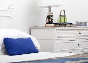 A bed or beds in a room at Casa Marta Capri