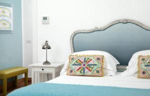 A bed or beds in a room at Casa Marta Capri