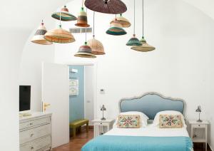 A bed or beds in a room at Casa Marta Capri