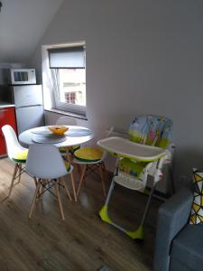 Kuchyňa alebo kuchynka v ubytovaní Apartament Słoneczny
