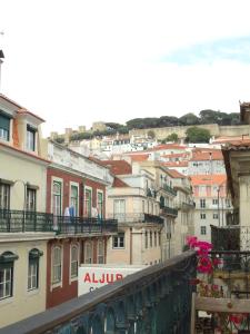 a view of a city from a balcony at New Aljubarrota Guest House in Lisbon